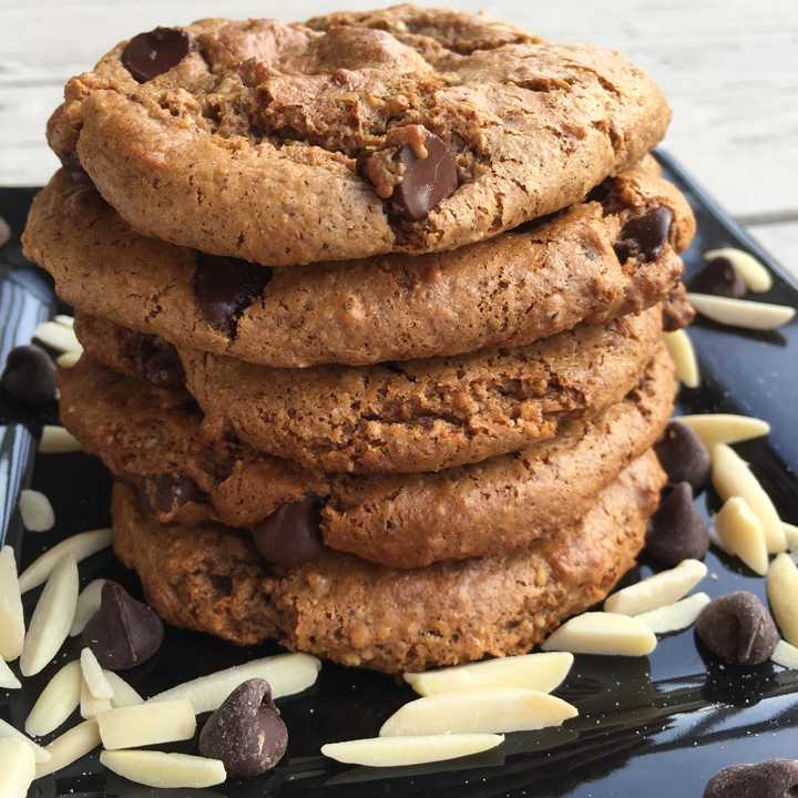 Looking for a gluten free almond butter cookies which are also flourless and vegan? Try these Paleo vegan almond butter chocolate chip cookies - This six ingredient easy to make paleo almond butter chocolate chip cookie recipe is flourless (naturally gluten free), eggless (it’s vegan!), and has no butter or oil, and is refined sugar free, with minimal coconut sugar for those limiting their sugar intake. These cookies are perfect for a healthier dessert or snack! #glutenfree #vegan #healthy #paleo